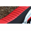 SDG 9 Pleat Gripper Seat Covers offer superior grip and traction for all riding conditions with 9 additional pleated sections and are available in black, red/black, green/black, orange/black and blue/black, depending on applications